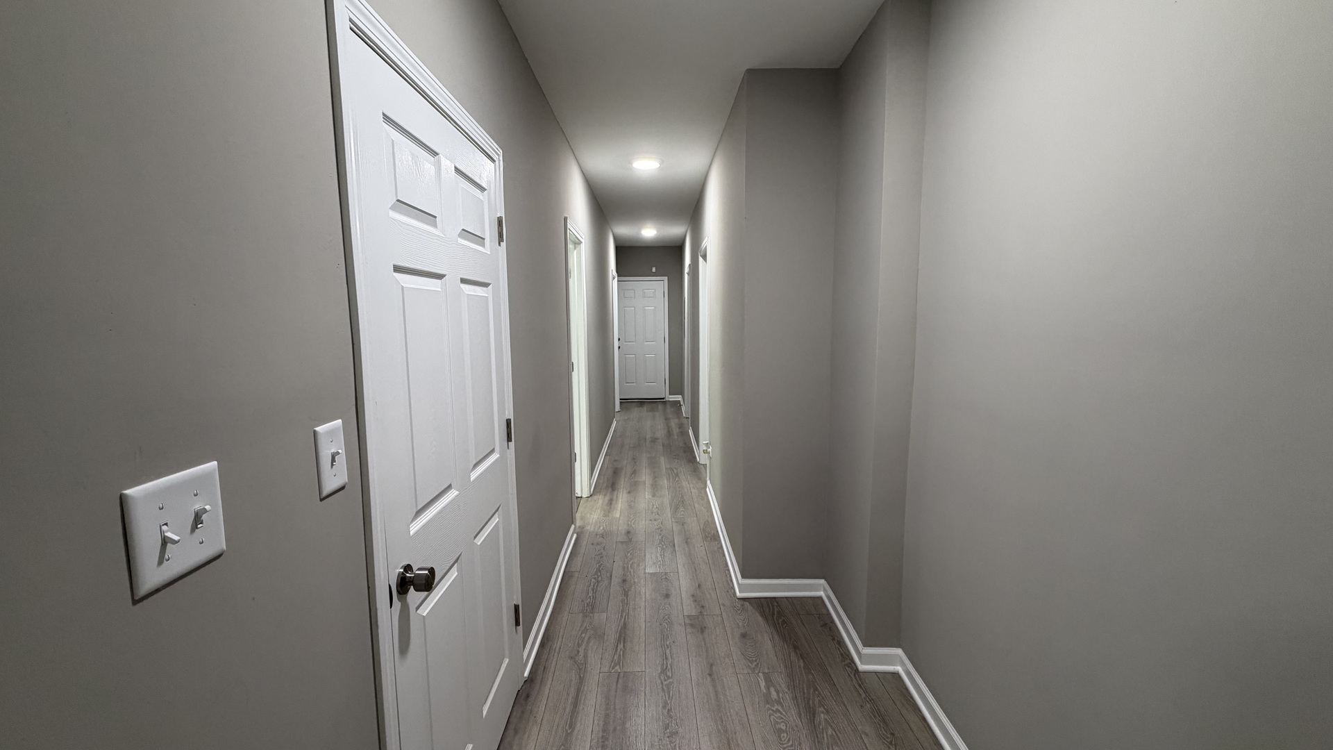 5344 South Aberdeen Street, Unit 1 Chicago, IL 60609 - Photo 9 of 17 a view of a hallway with wooden floor