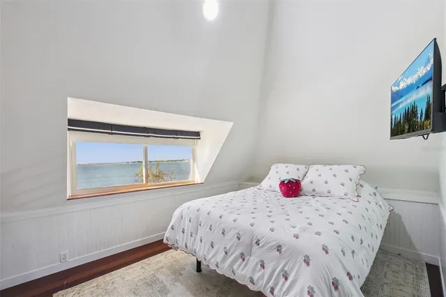 a view of a town with mountains in the background