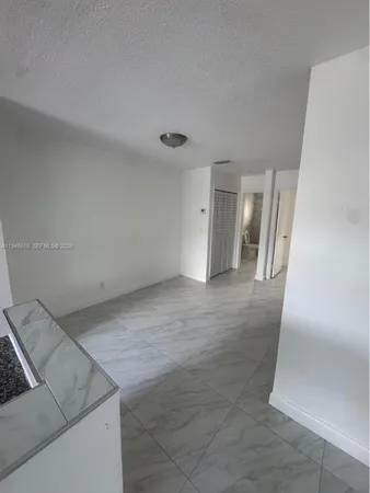 a view of livingroom and hardwood