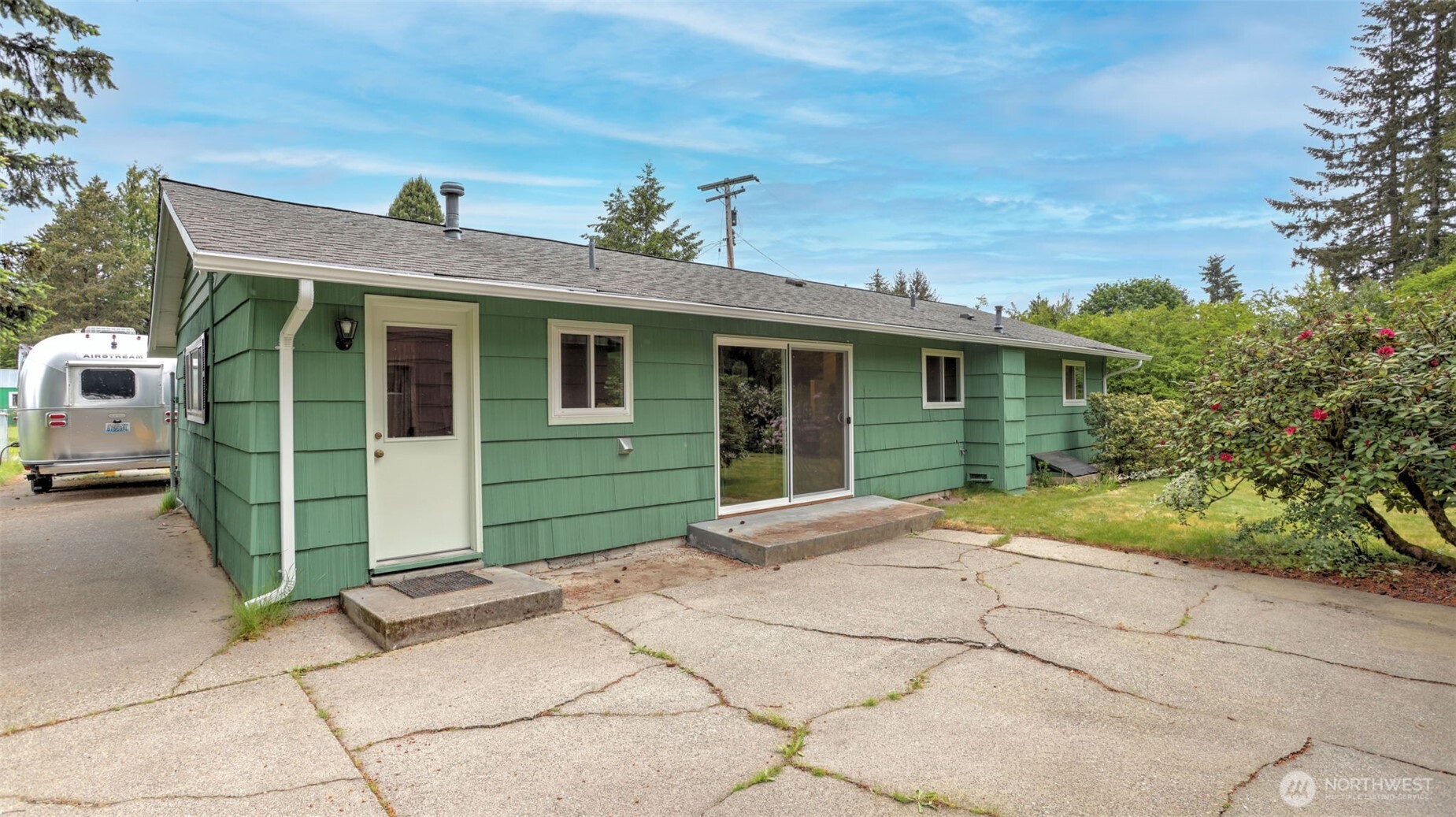 12515 Southeast 171st Street Renton, WA 98058 - Photo 24 of 24 a view of a house with a yard