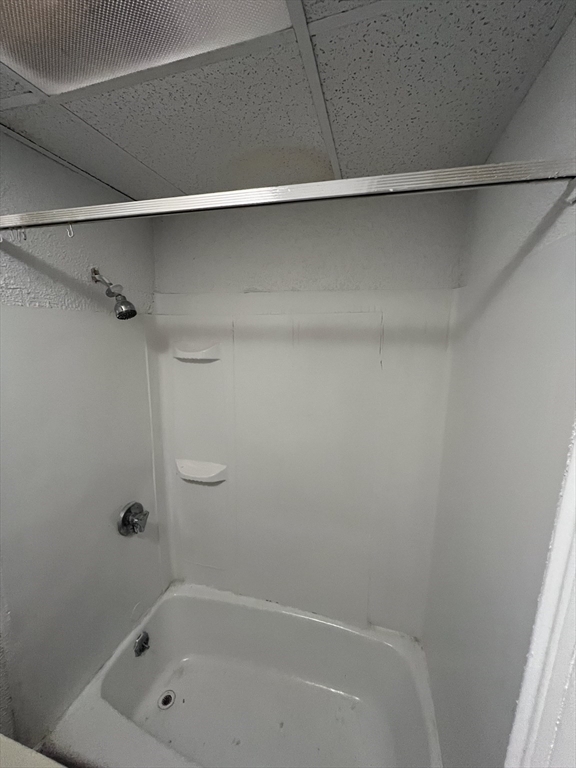 181 Division Street Fall River, MA 02721 - Photo 11 of 14 a bathroom with a bath tub and a shower