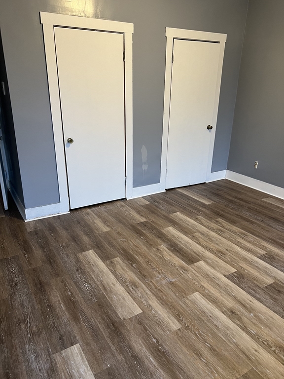 181 Division Street Fall River, MA 02721 - Photo 2 of 14 a view of empty room with wooden floor