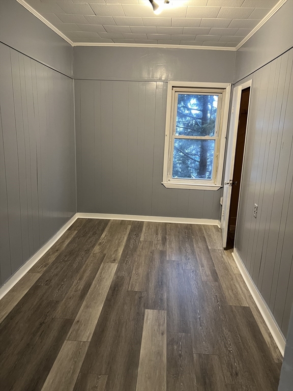 181 Division Street Fall River, MA 02721 - Photo 6 of 14 a view of room with window and hardwood floor