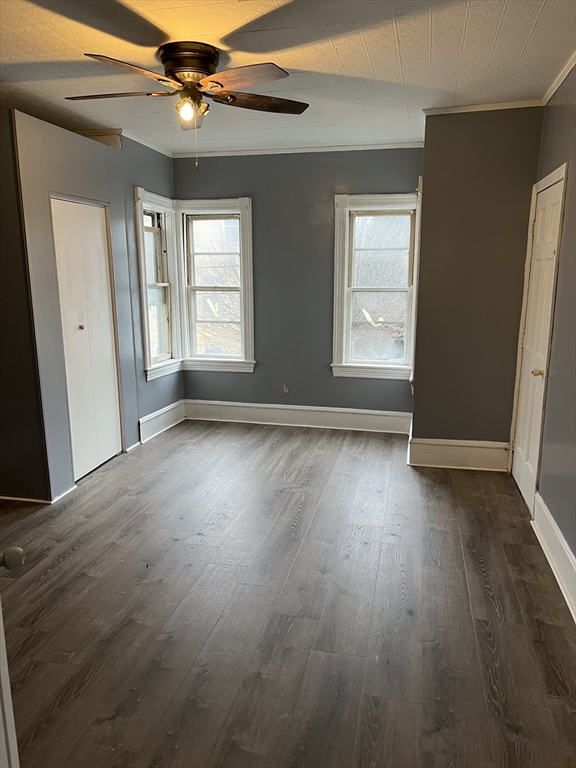 181 Division Street Fall River, MA 02721 - Photo 8 of 14 a view of livingroom with hardwood floor and window
