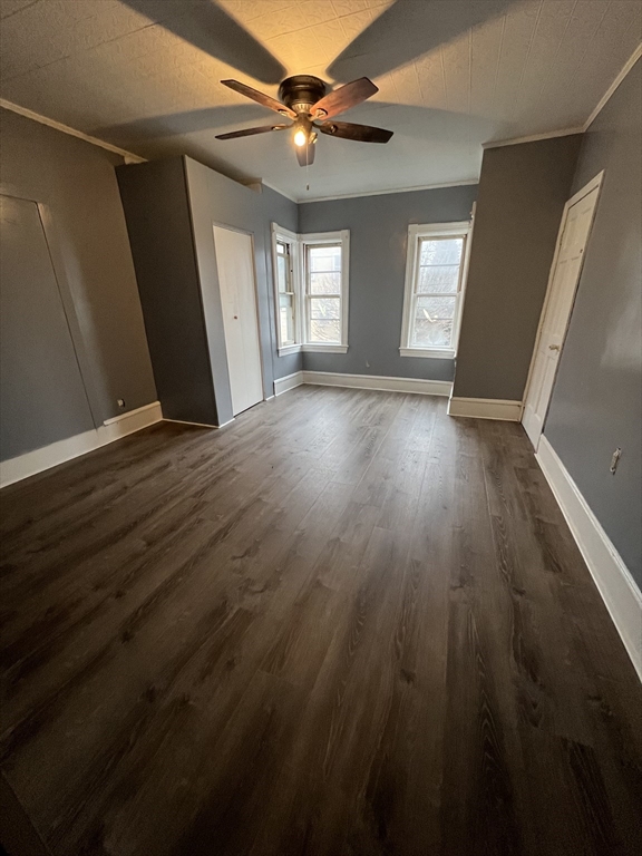 181 Division Street Fall River, MA 02721 - Photo 10 of 14 wooden floor in an empty room with a window