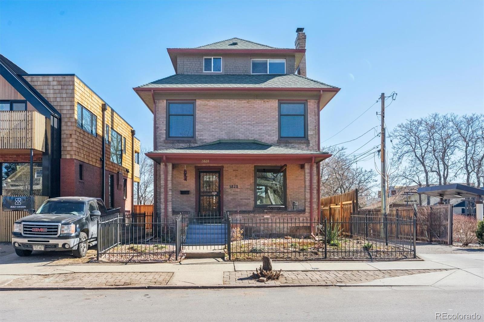 3828 Tejon Street Denver, CO 80211 - Photo 2 of 36 a front view of a building with street