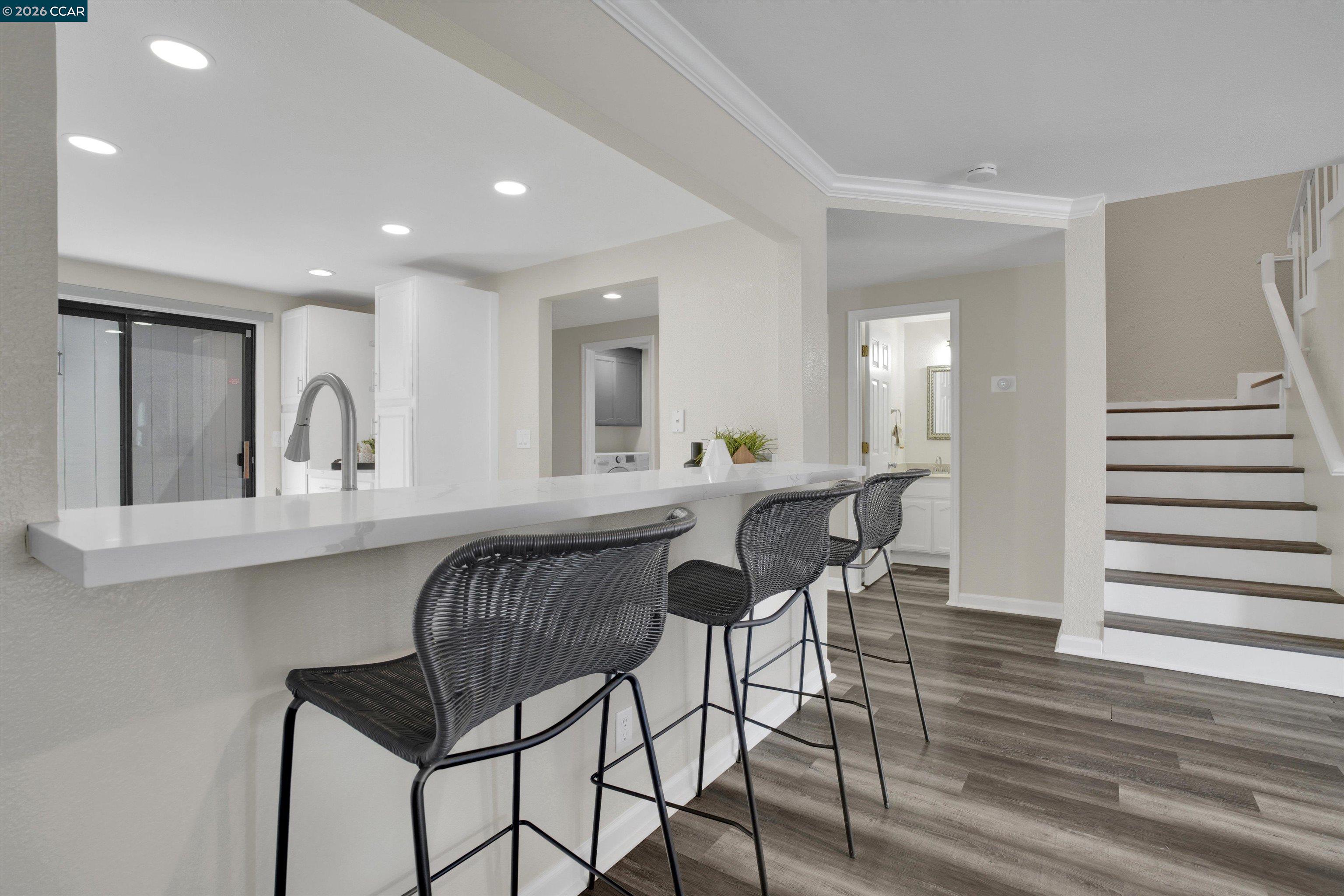 1605 Riverlake Road Discovery Bay, CA 94505 - Photo 12 of 39 a view of a dining room with furniture and wooden floor