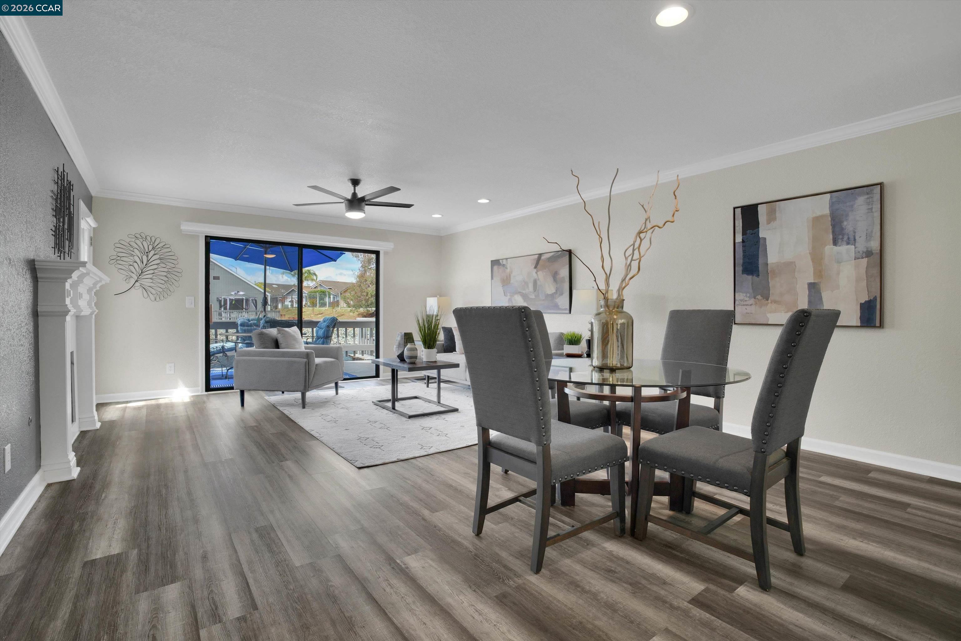 1605 Riverlake Road Discovery Bay, CA 94505 - Photo 13 of 39 a view of a dining room with furniture window and wooden floor