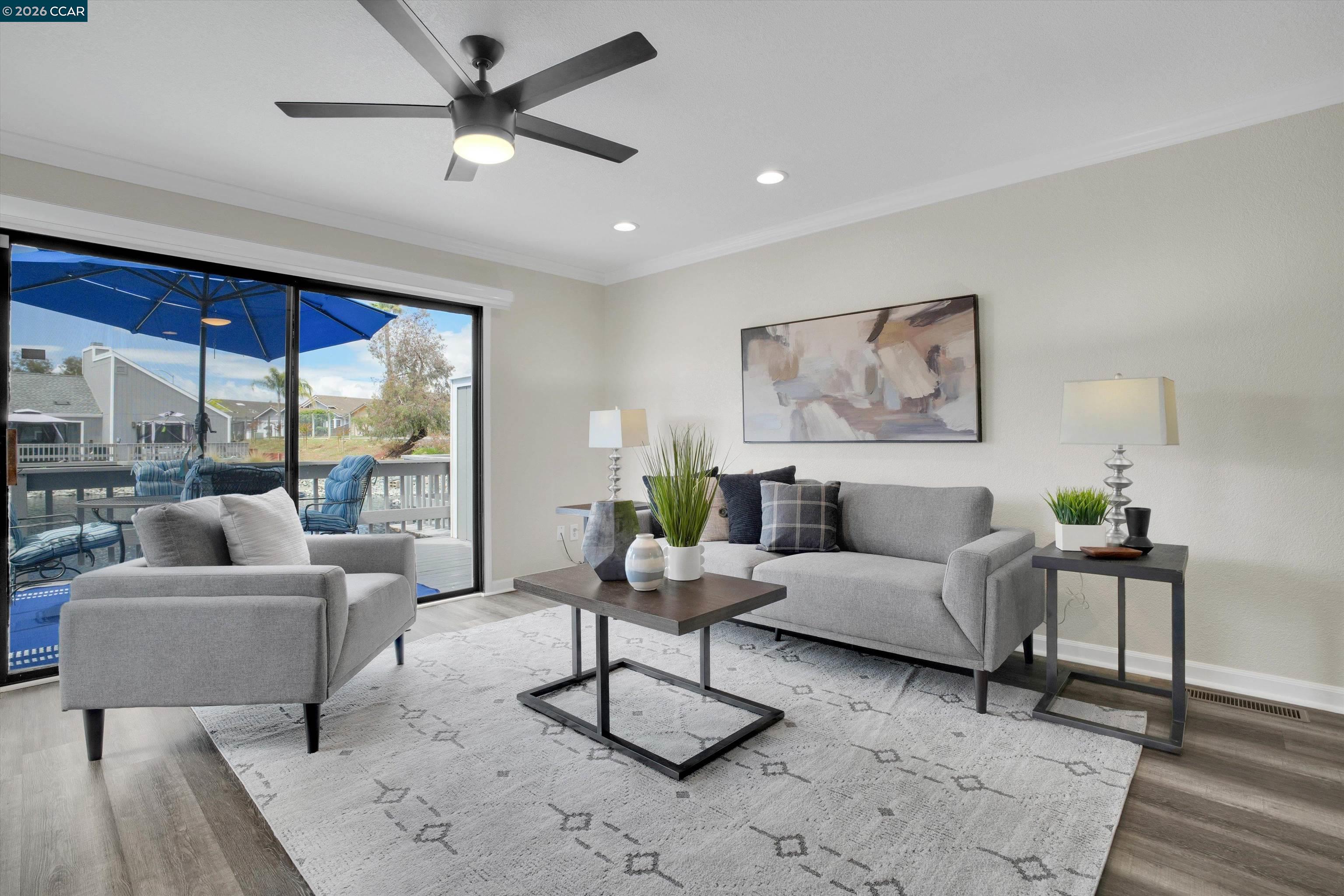 1605 Riverlake Road Discovery Bay, CA 94505 - Photo 15 of 39 a living room with furniture and a large window