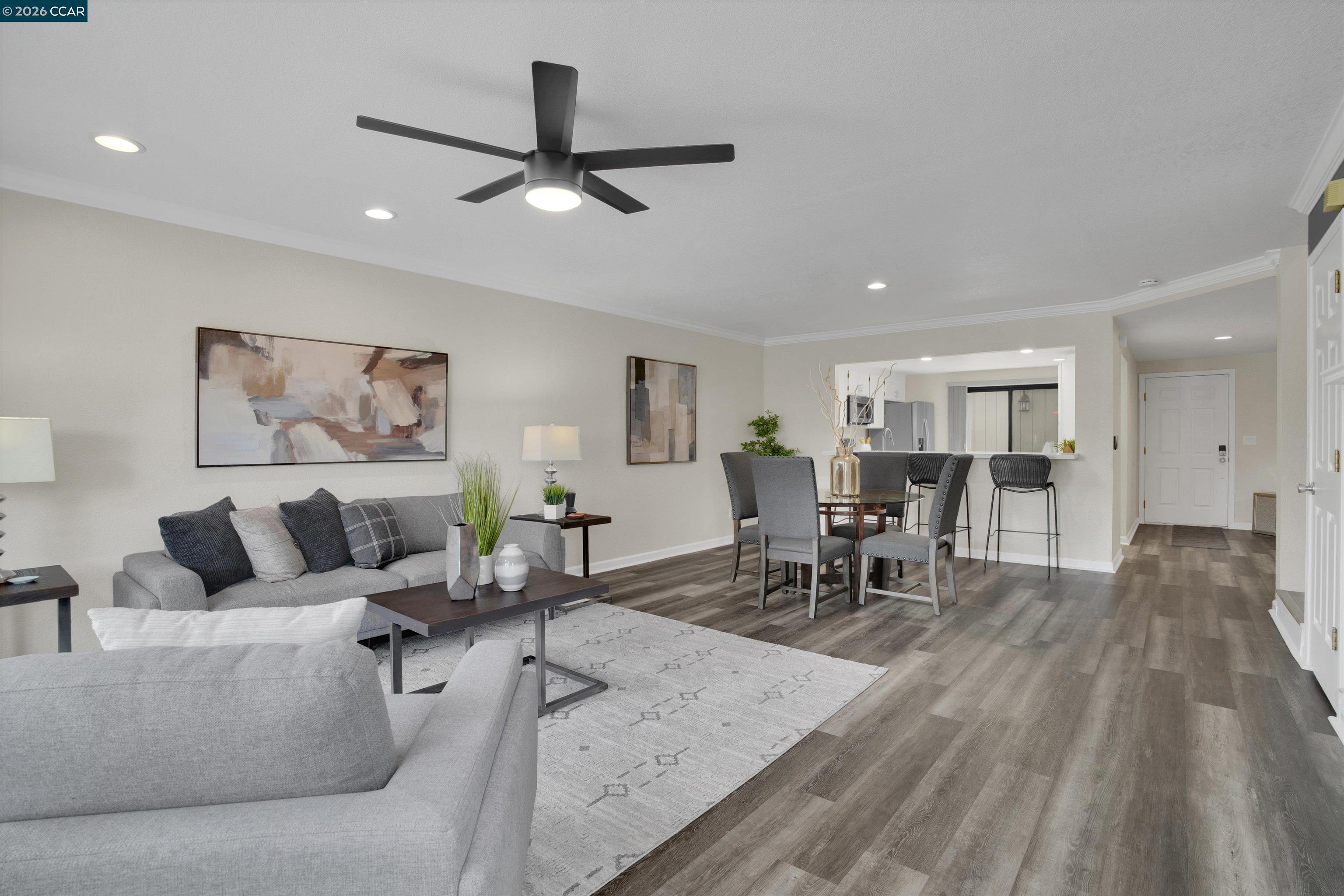 1605 Riverlake Road Discovery Bay, CA 94505 - Photo 17 of 39 a living room with furniture and a wooden floor