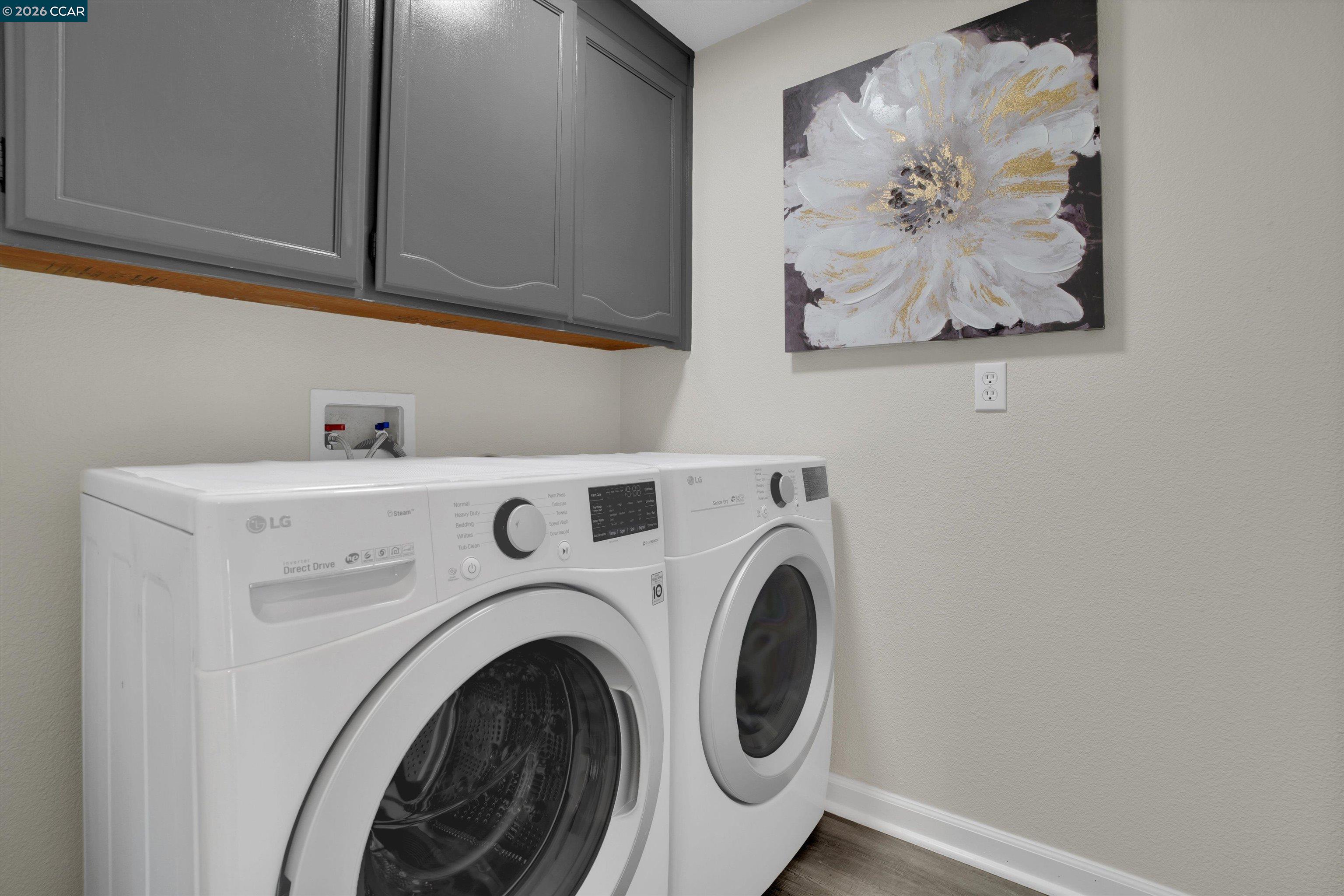 1605 Riverlake Road Discovery Bay, CA 94505 - Photo 19 of 39 a utility room with dryer and washer
