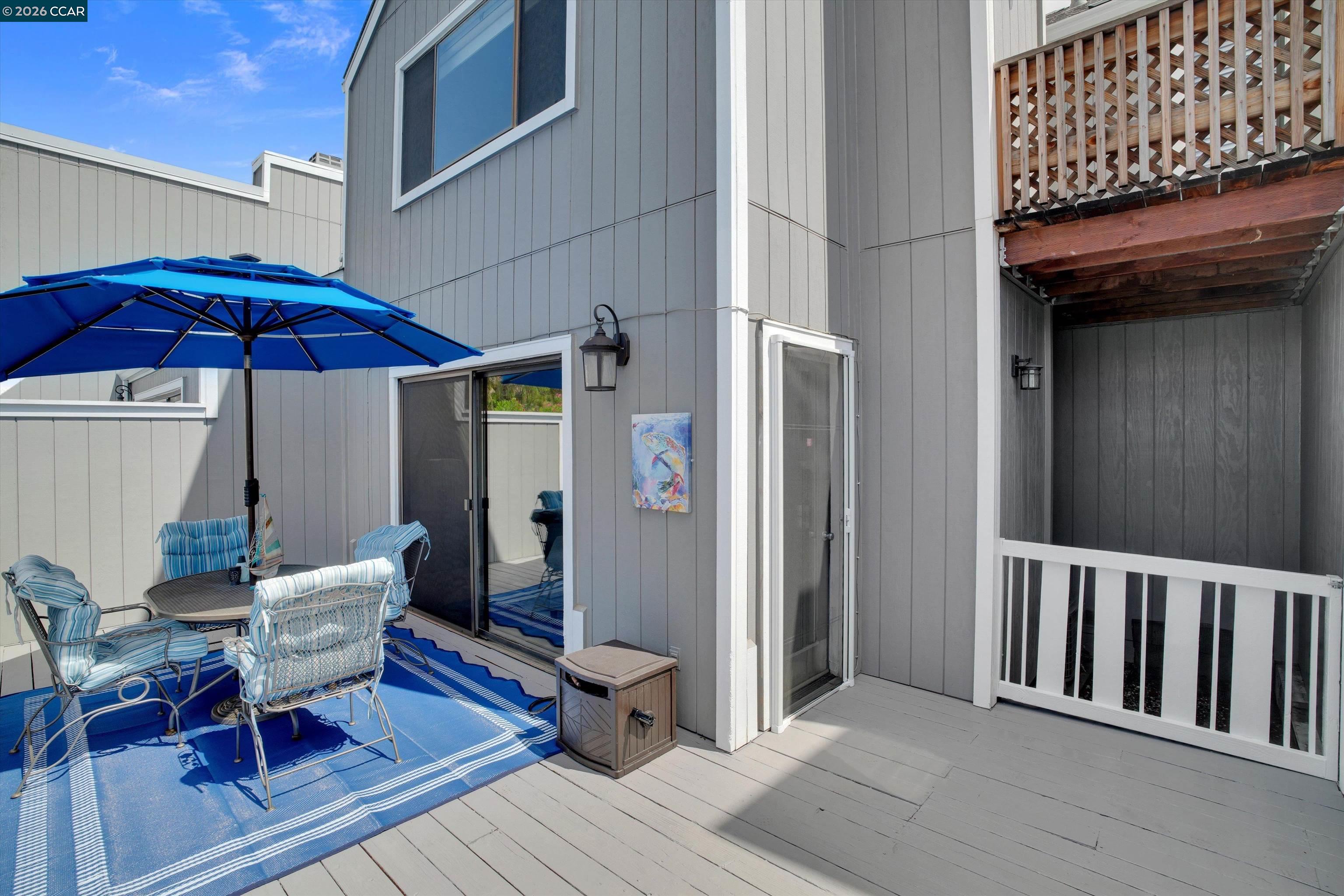 1605 Riverlake Road Discovery Bay, CA 94505 - Photo 21 of 39 a view of a dinning tables and chairs in the balcony
