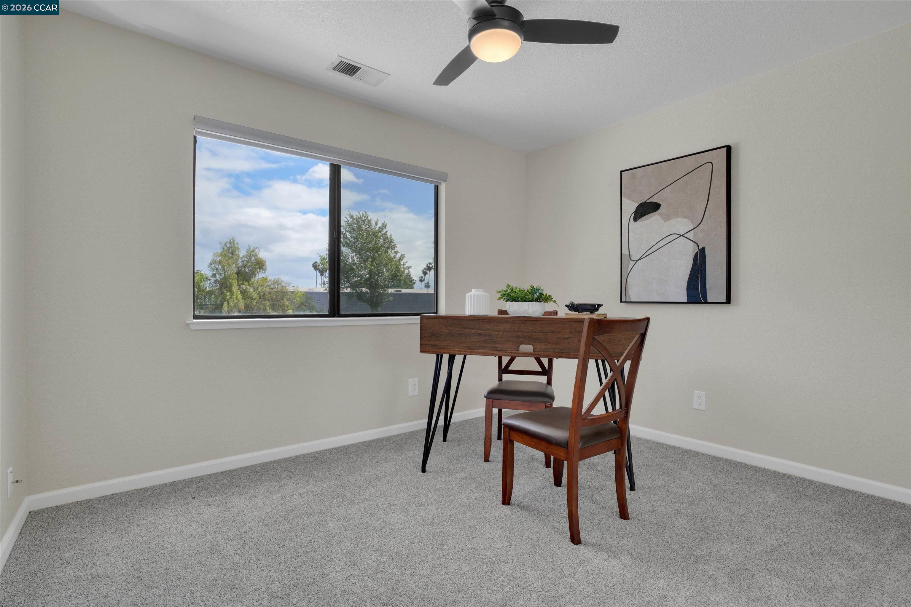 1605 Riverlake Road Discovery Bay, CA 94505 - Photo 31 of 39 a dining room with furniture and window