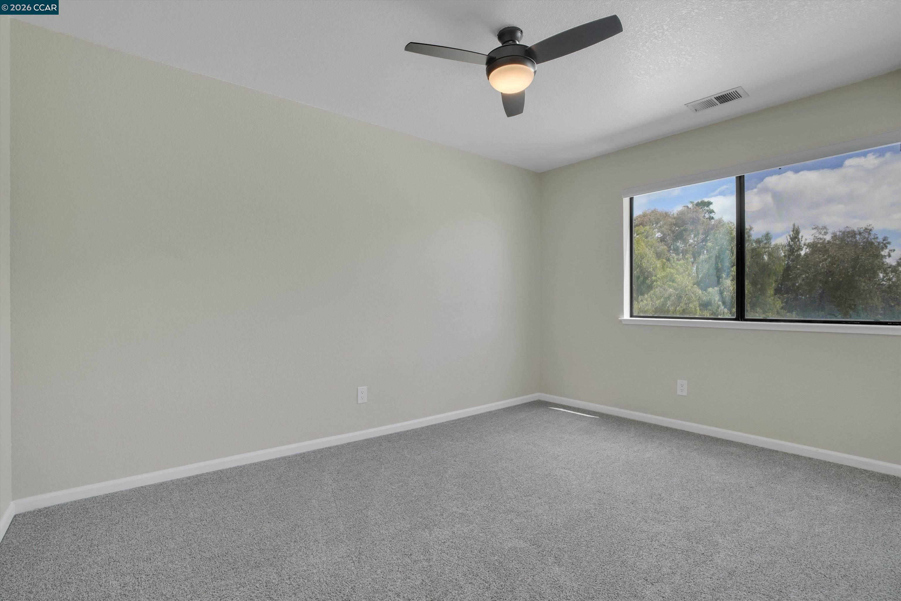 1605 Riverlake Road Discovery Bay, CA 94505 - Photo 33 of 39 an empty room with a window