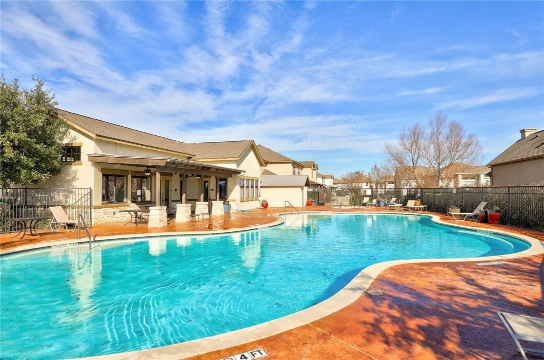 2105 Town Centre Drive, Unit 49 Round Rock, TX 78664 - Photo 19 of 22 a view of a house with swimming pool