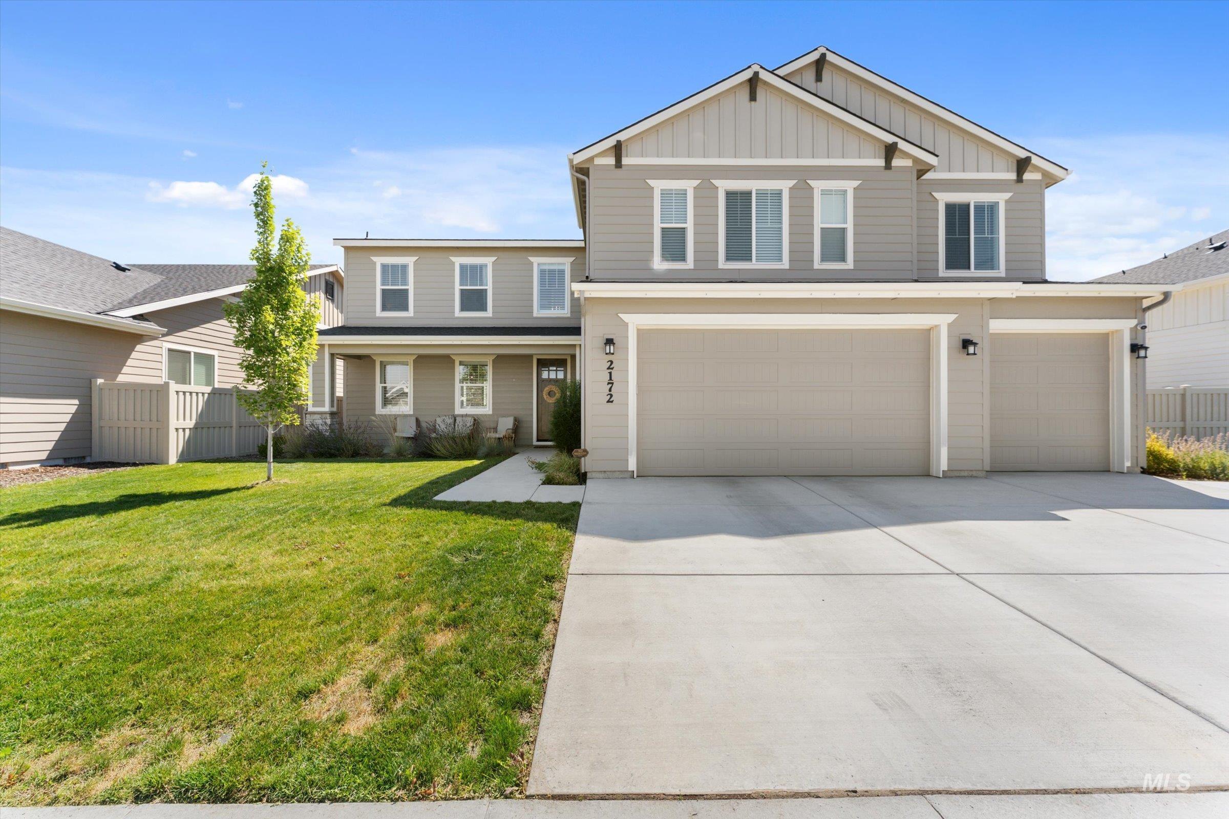 2172 Savoy Court Middleton, ID 83644 - Photo 1 of 46 Open-concept interior featuring light wood-finish flooring throughout