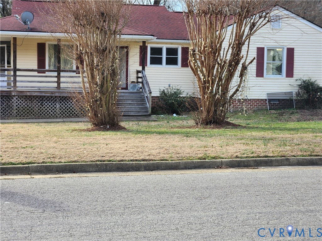 6833 Hearthside Drive Prince George, VA 23875 - Photo 3 of 6 a view of a house with a yard