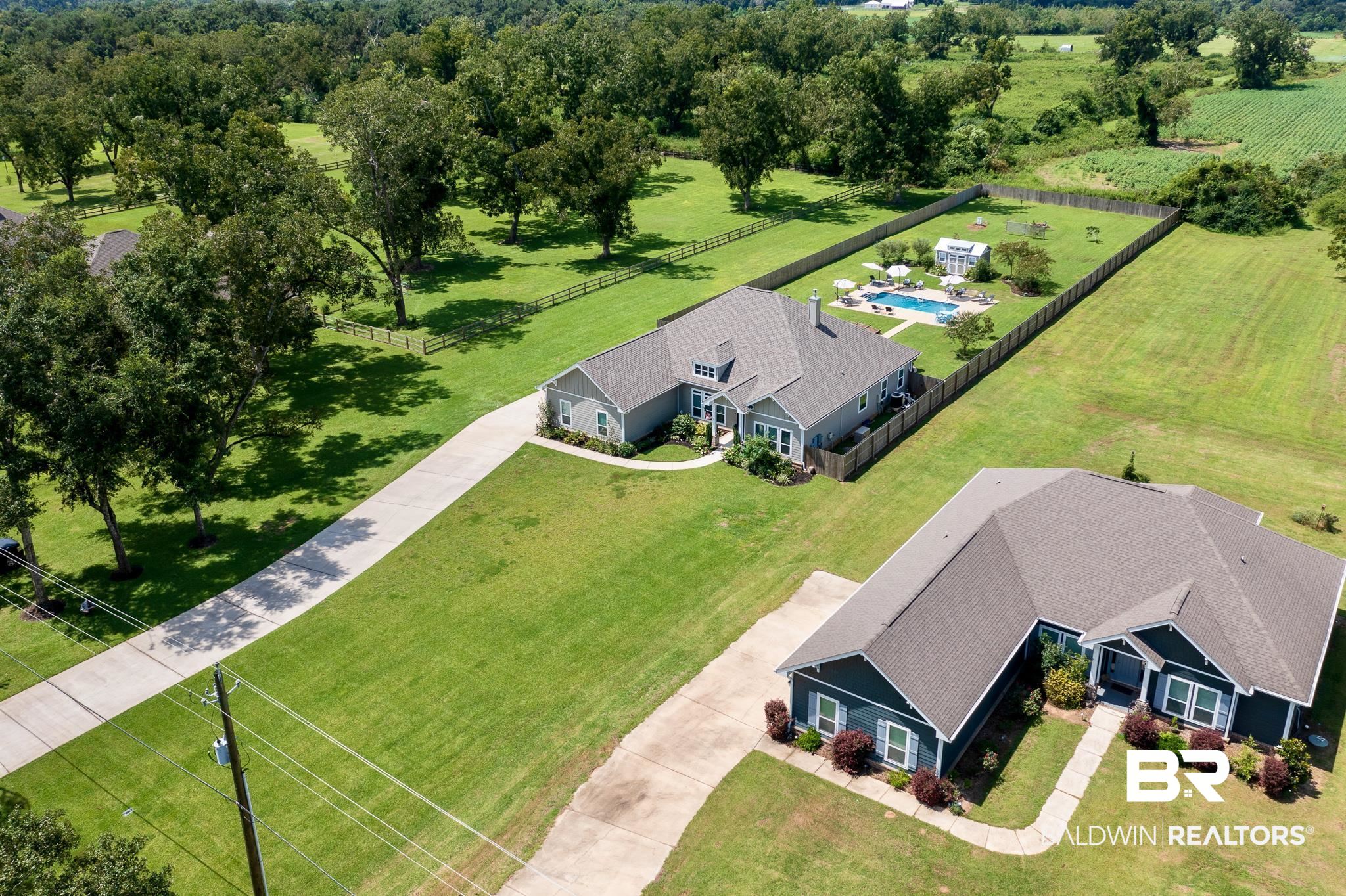 12295 Pecan Grove Street Foley, AL 36535 - Photo 1 of 41 SALT WATER SWIMMING POOL + OVER 1 ACRE