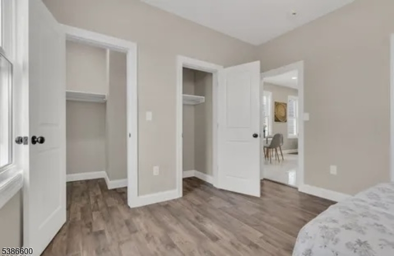89 Schley Street, Unit 2 Newark, NJ 07112 - Photo 10 of 18 a view of a livingroom with wooden floor