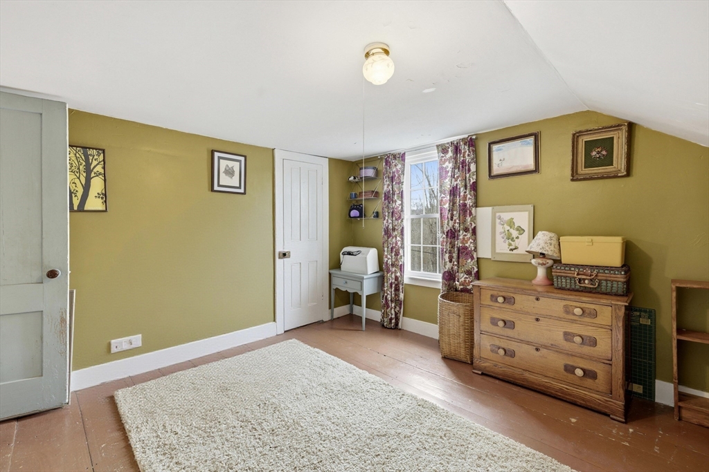 118 North Leverett Road Leverett, MA 01054 - Photo 16 of 26 a bed room with a bed and a dresser