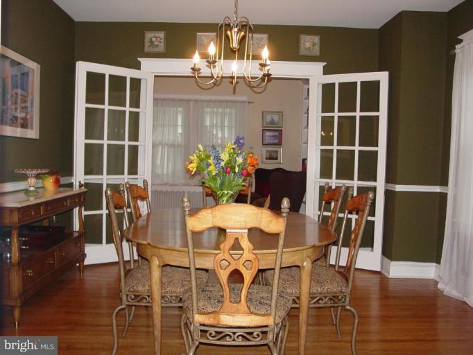 520 Anneslie Road Baltimore, MD 21212 - Photo 12 of 29 Originals french doors lead to living room.