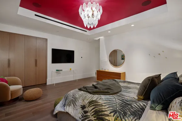 a view of a chairs and table in patio