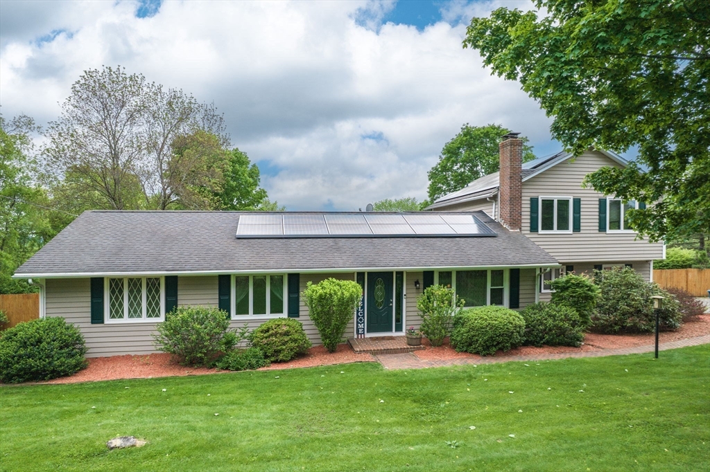 98 Town Farm Road Monson, MA 01057 - Photo 3 of 41 a front view of a house with a yard