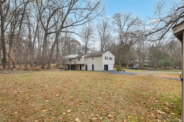 a house with trees in front of it