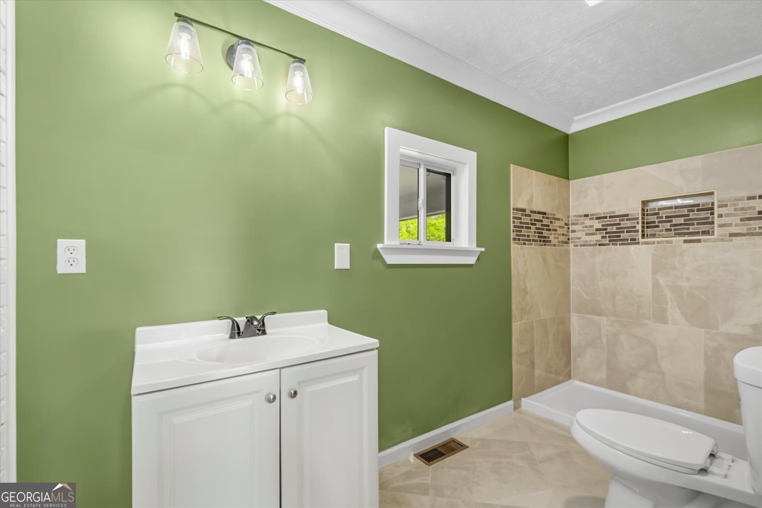 832 Snow Springs Road Northwest Adairsville, GA 30103 - Photo 12 of 35 a bathroom with a sink a toilet and shower