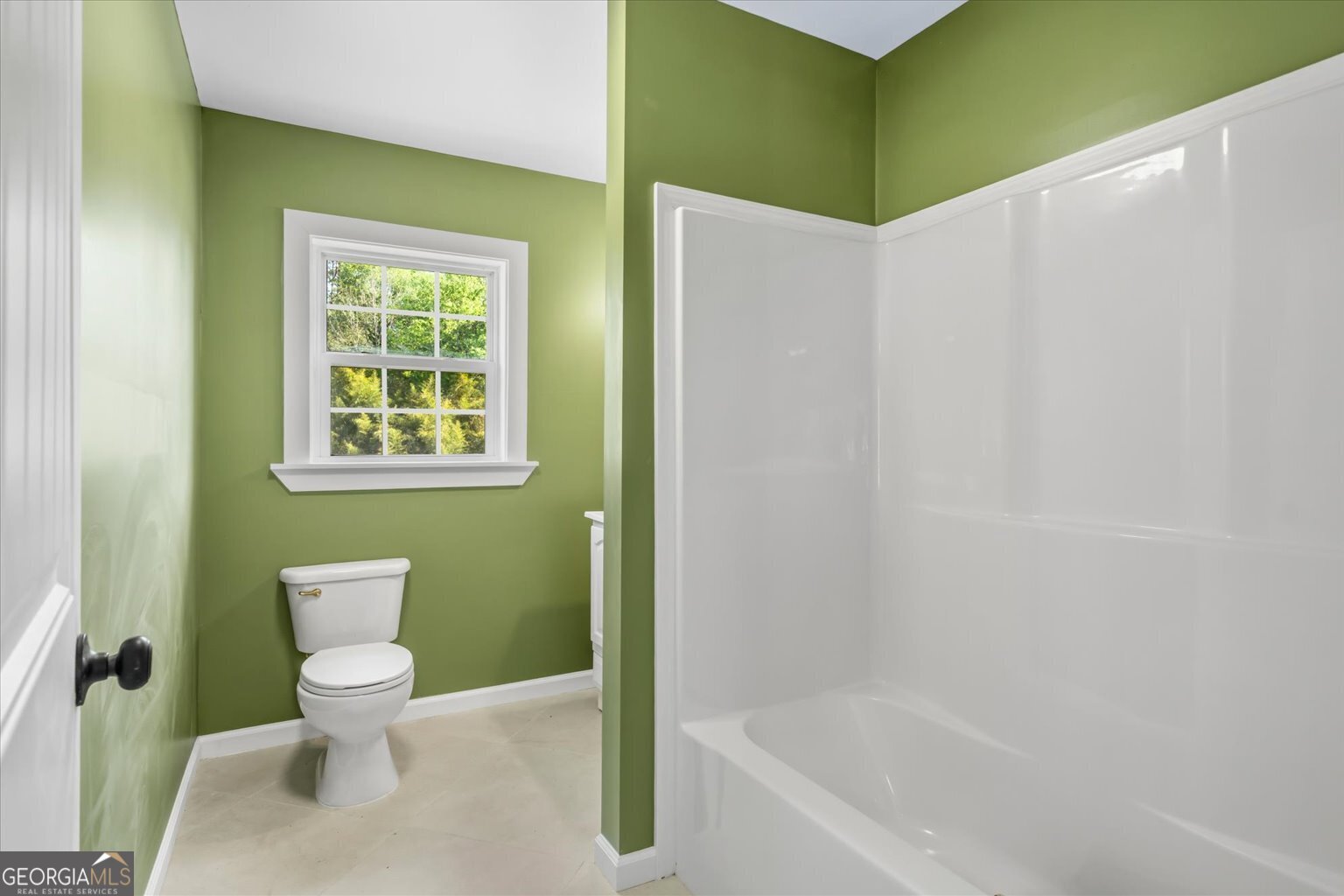 832 Snow Springs Road Northwest Adairsville, GA 30103 - Photo 17 of 35 a bathroom with a toilet and a shower