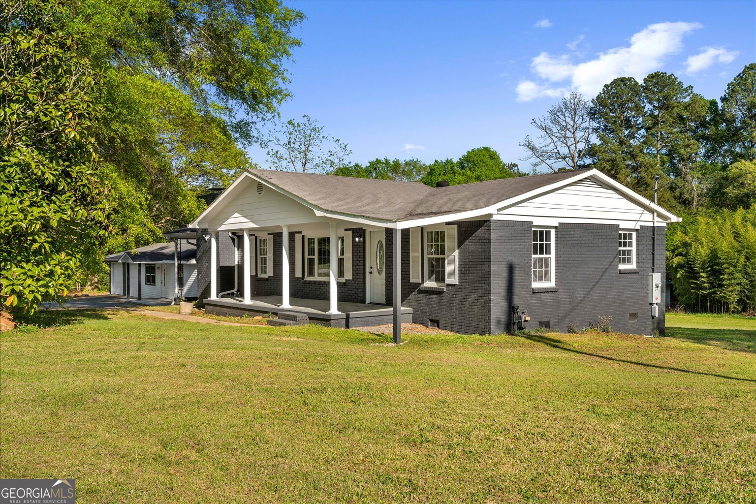 832 Snow Springs Road Northwest Adairsville, GA 30103 - Photo 2 of 35 a view of a house with a yard
