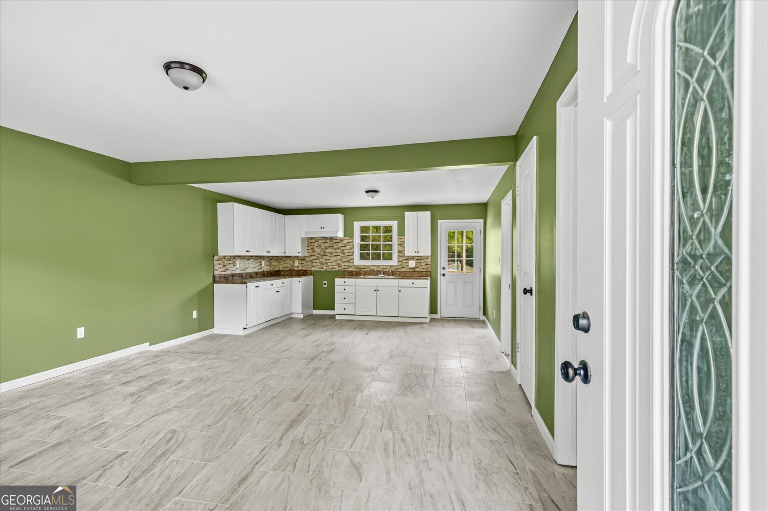 832 Snow Springs Road Northwest Adairsville, GA 30103 - Photo 23 of 35 a view of a kitchen with a sink and cabinets