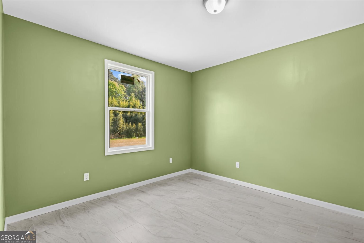 832 Snow Springs Road Northwest Adairsville, GA 30103 - Photo 27 of 35 an empty room with a window
