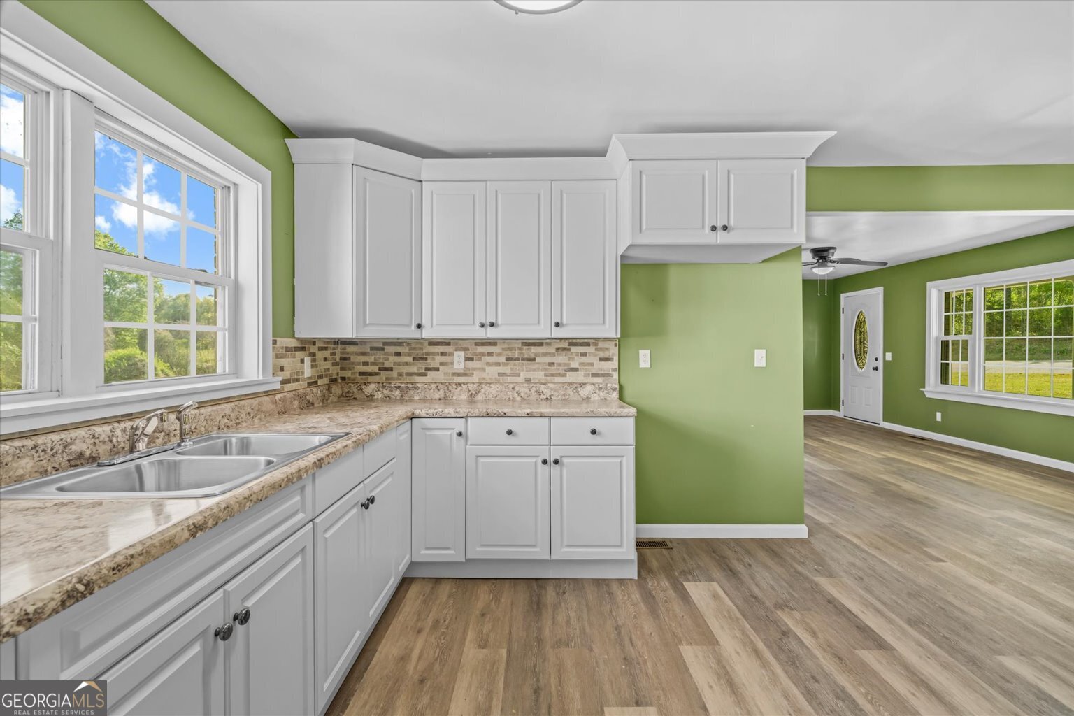 832 Snow Springs Road Northwest Adairsville, GA 30103 - Photo 9 of 35 a kitchen with sink and cabinets