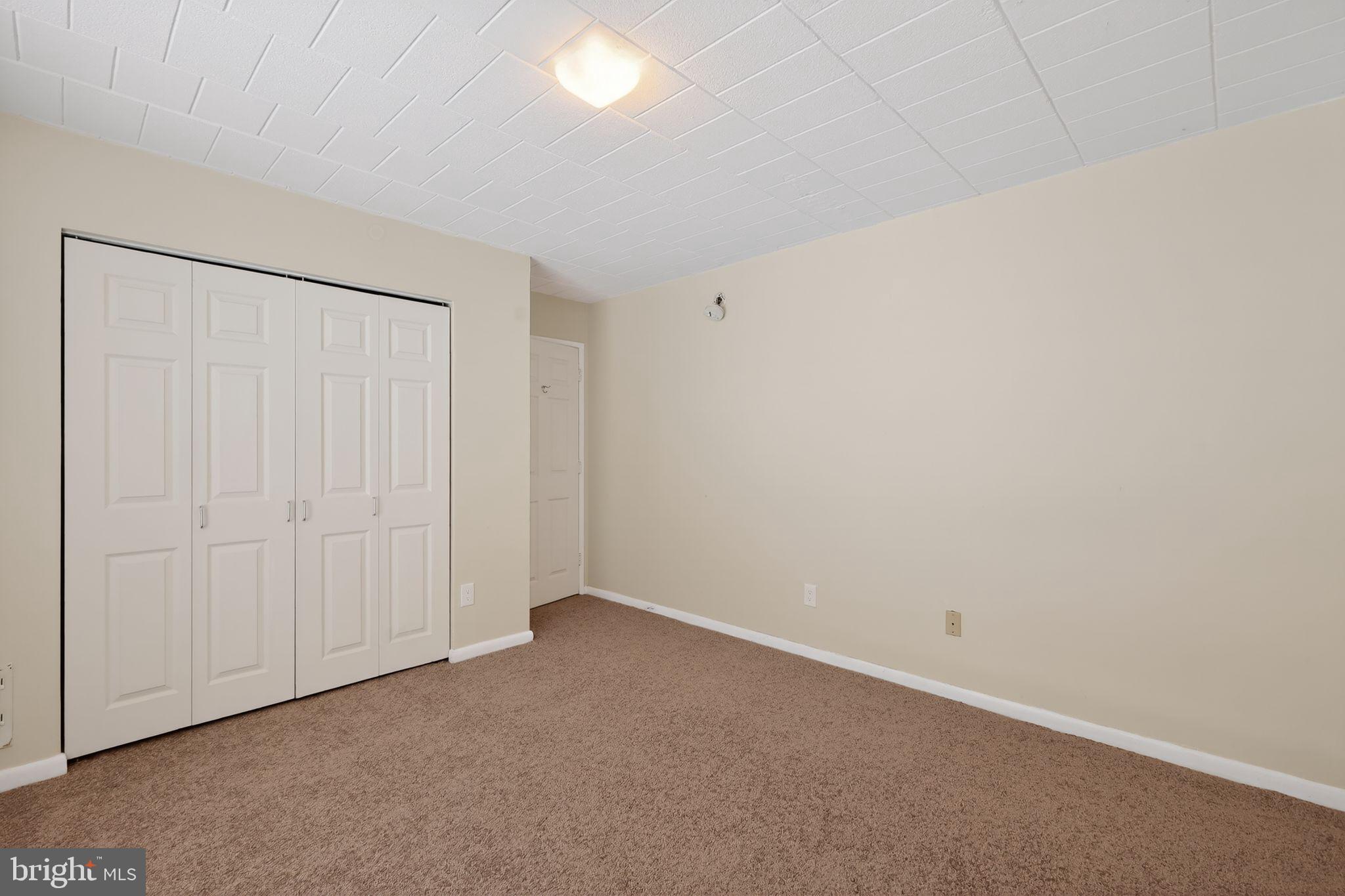 1619 Gainesville Street Southeast, Unit T Washington, DC 20020 - Photo 12 of 14 a view of an empty room