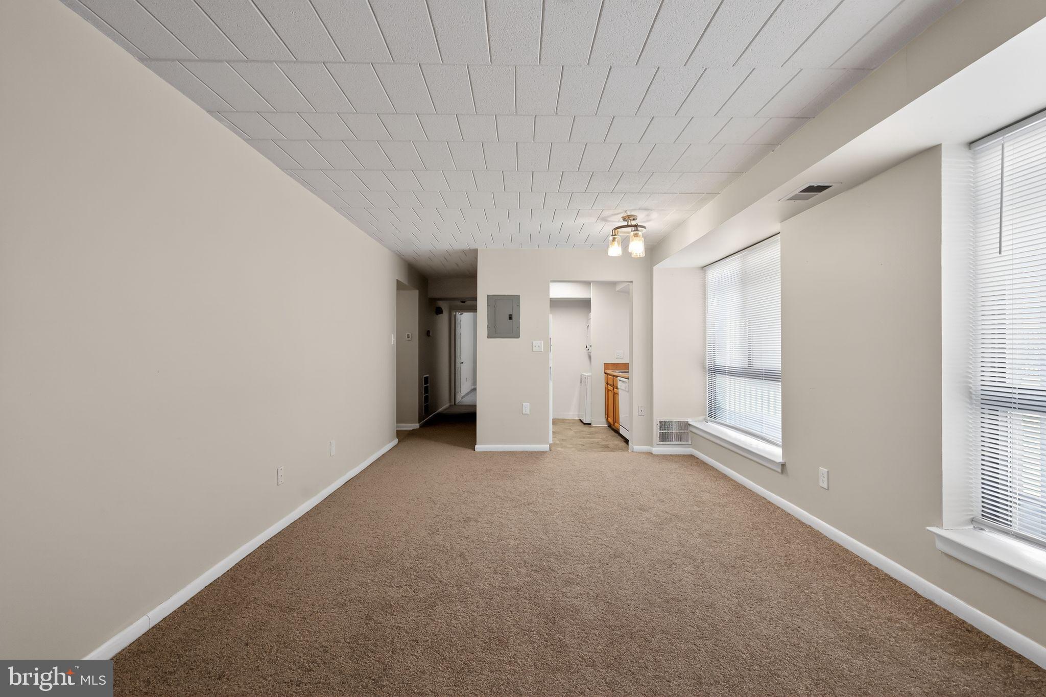 1619 Gainesville Street Southeast, Unit T Washington, DC 20020 - Photo 5 of 14 a view of empty room with an empty space