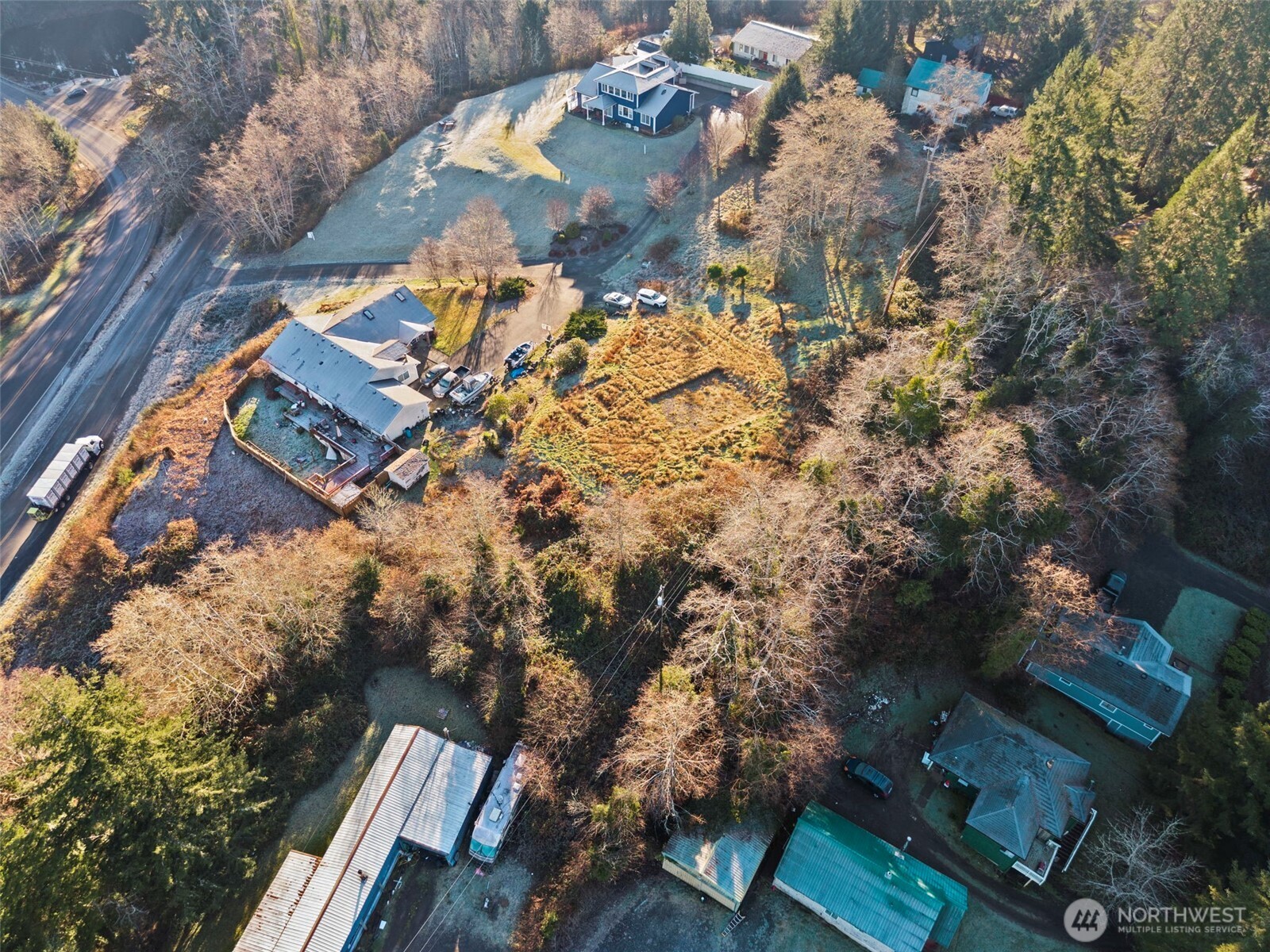 X Pacific Avenue Raymond, WA 98577 - Photo 12 of 13 an aerial view of residential houses with outdoor space
