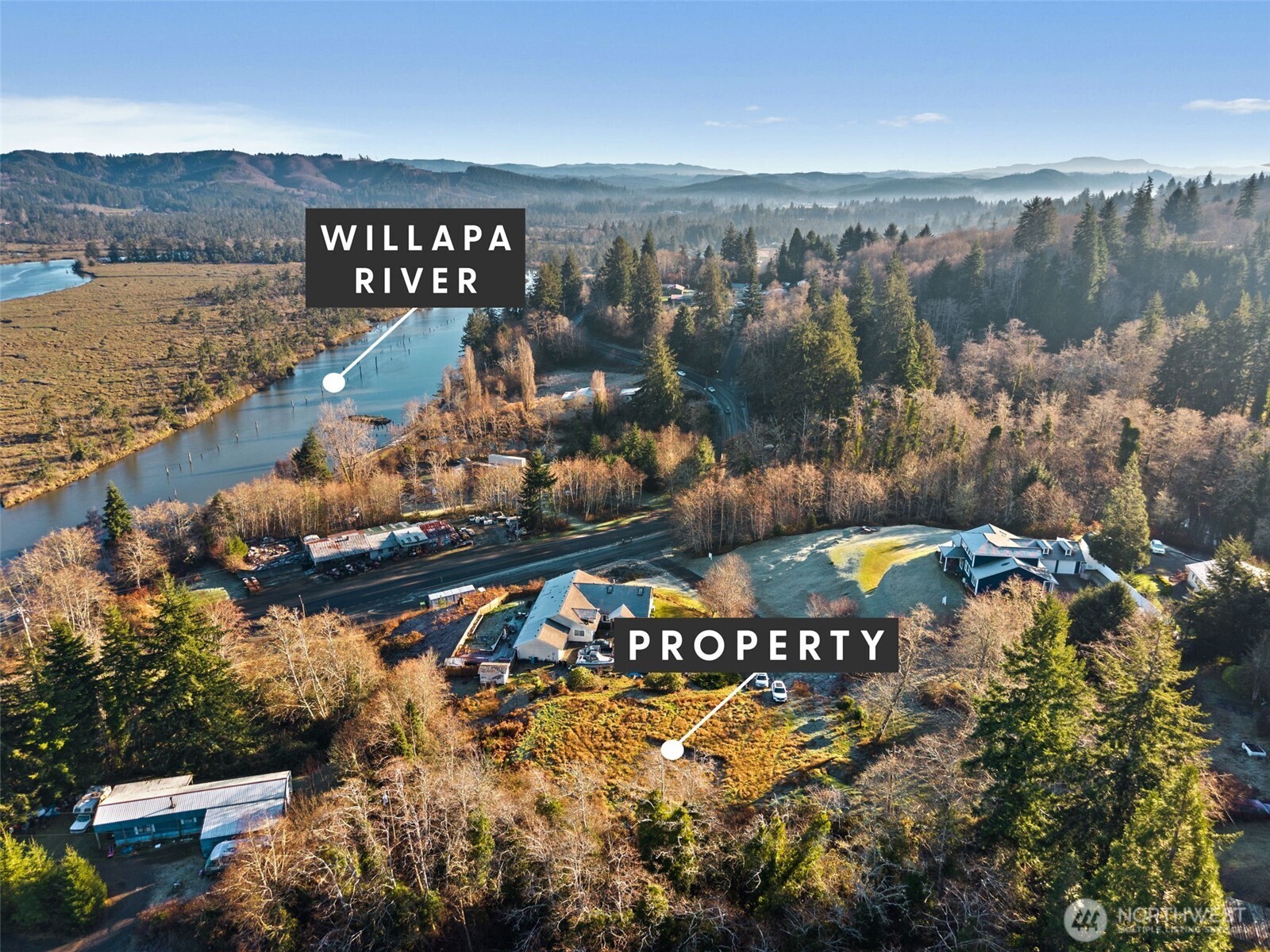 X Pacific Avenue Raymond, WA 98577 - Photo 5 of 13 an aerial view of a house with a lake view