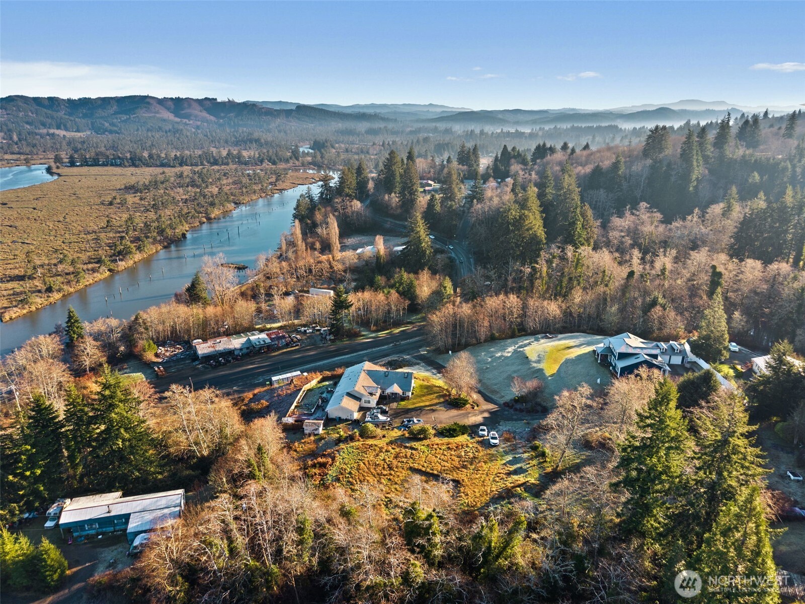 X Pacific Avenue Raymond, WA 98577 - Photo 6 of 13 an aerial view of residential houses with outdoor space