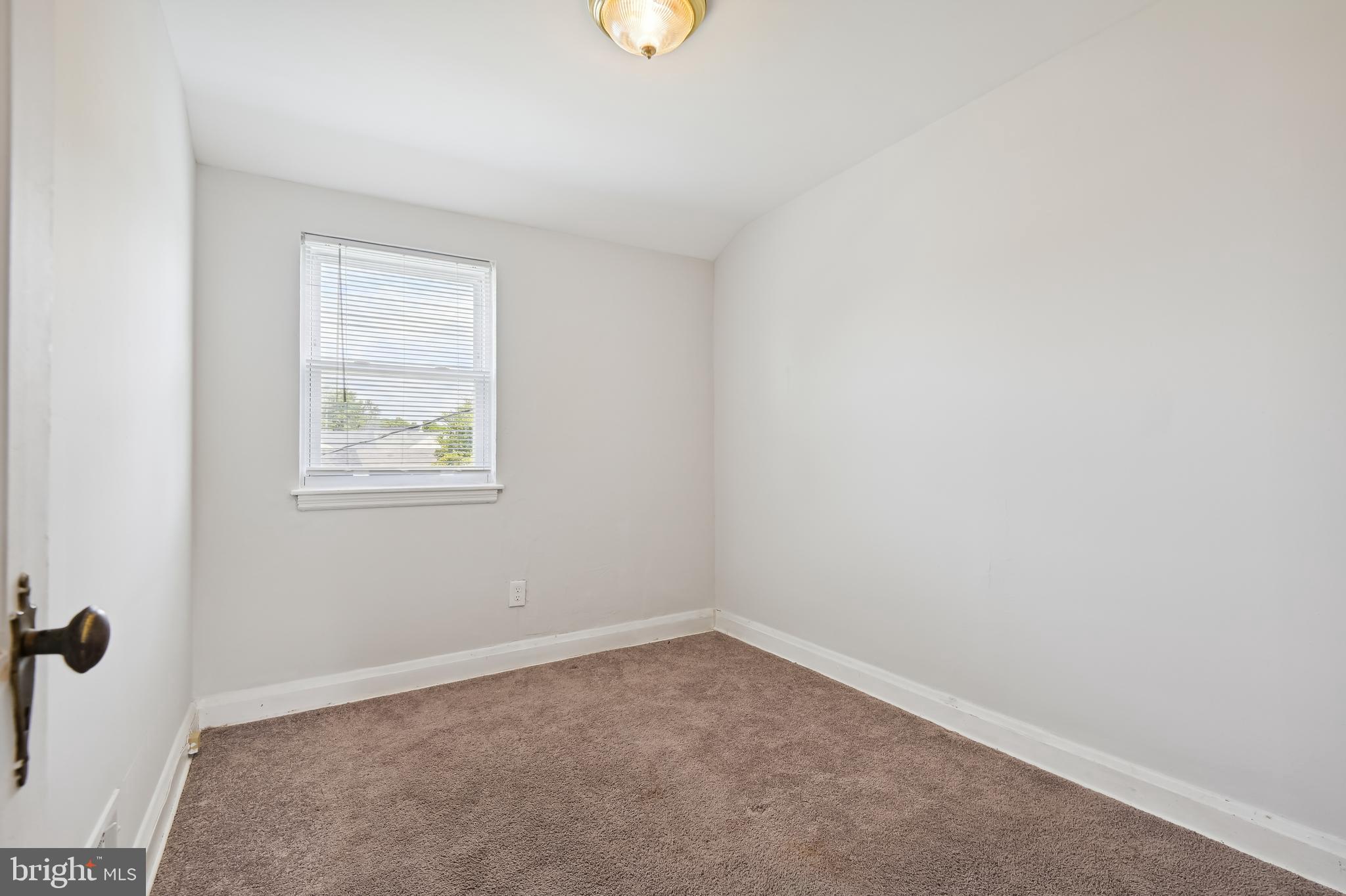 5758 Maplehill Road Baltimore, MD 21239 - Photo 13 of 17 Improved Bedroom