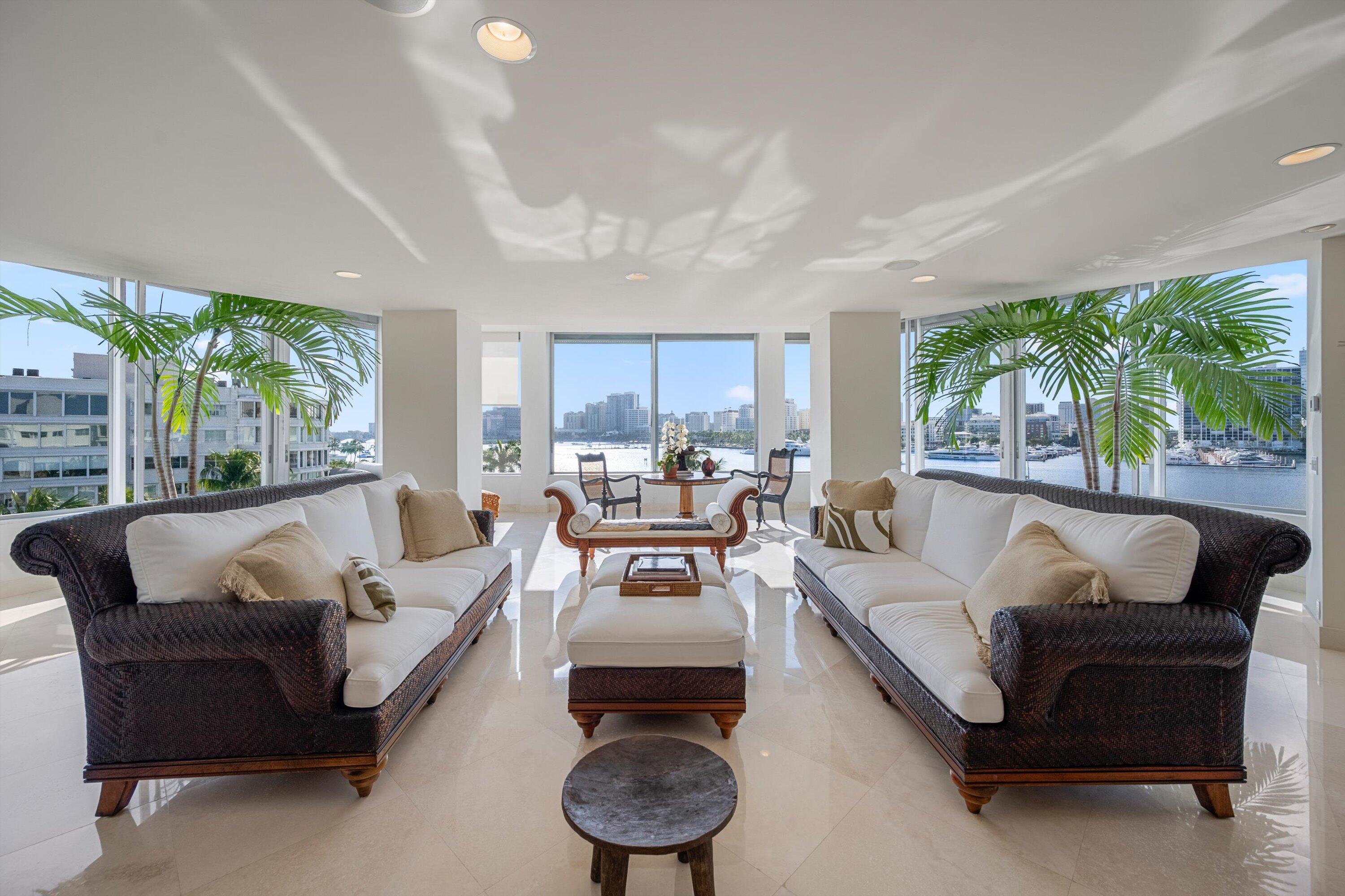44 Cocoanut Row, Unit 514A Palm Beach, FL 33480 - Photo 1 of 36 a living room with furniture and a large window