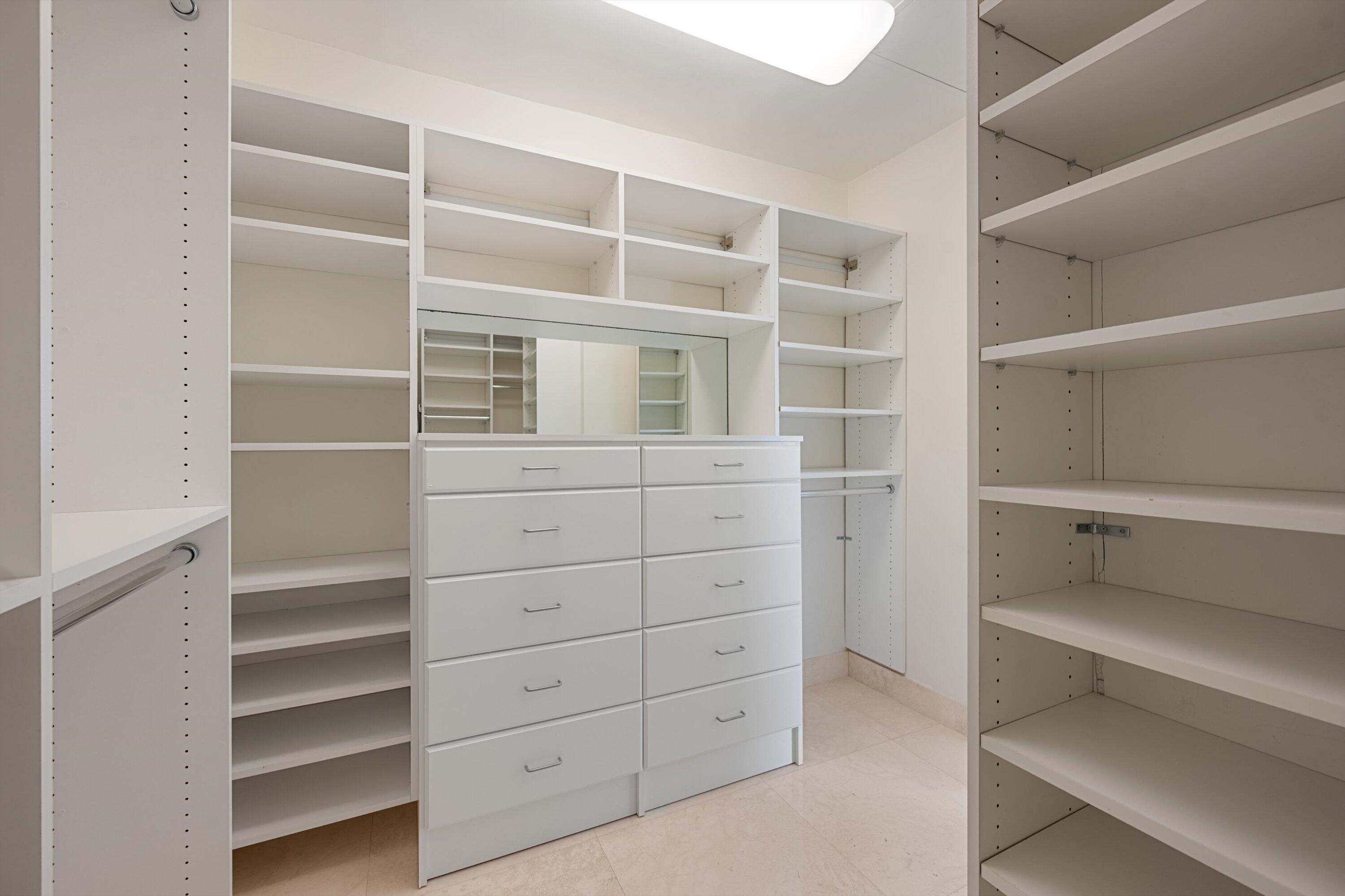 44 Cocoanut Row, Unit 514A Palm Beach, FL 33480 - Photo 15 of 36 a view of an empty walk in closet