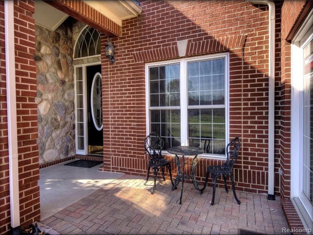 9247 Crockett Farm Road South Lyon, MI 48178 - Photo 3 of 50 3 front patio.jpg