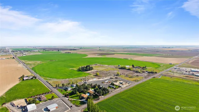 a view of a swimming pool with an outdoor space and seating area