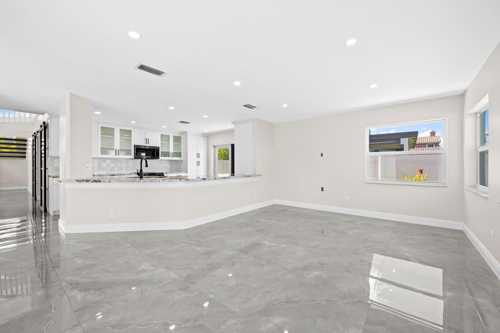 23162 L'Ermitage Circle Boca Raton, FL 33433 - Photo 17 of 48 a view of kitchen with refrigerator and window