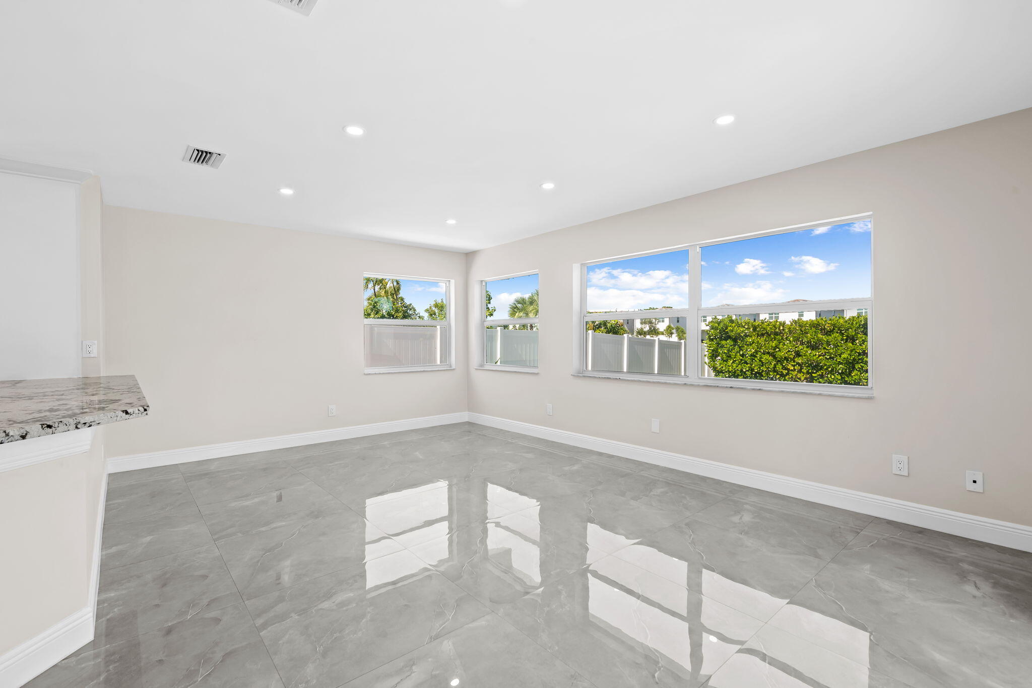 23162 L'Ermitage Circle Boca Raton, FL 33433 - Photo 18 of 48 a view of an empty room with a window