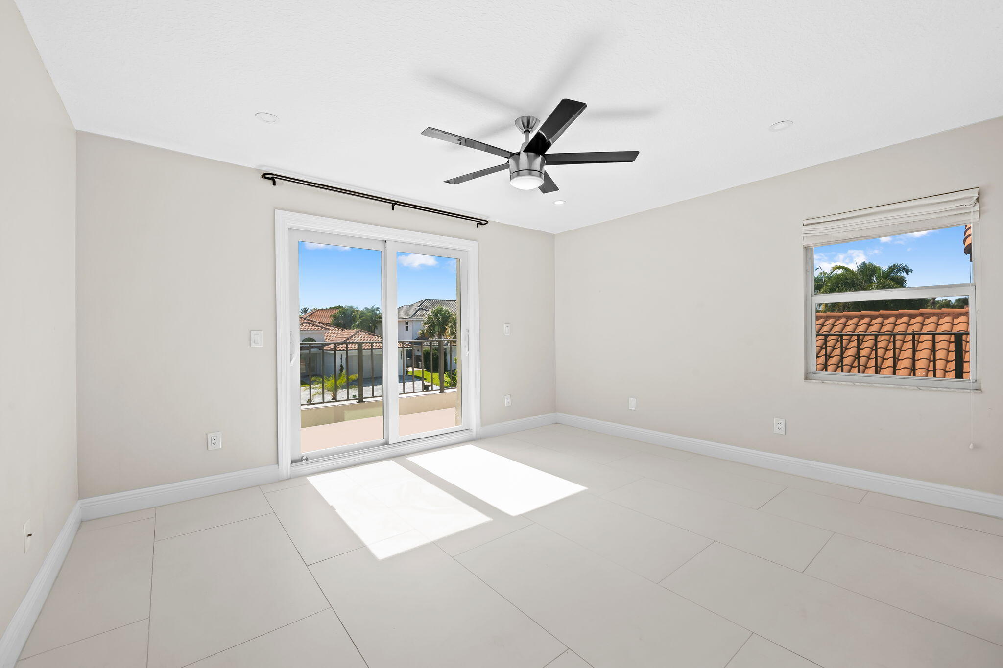 23162 L'Ermitage Circle Boca Raton, FL 33433 - Photo 25 of 48 a view of an empty room with a window