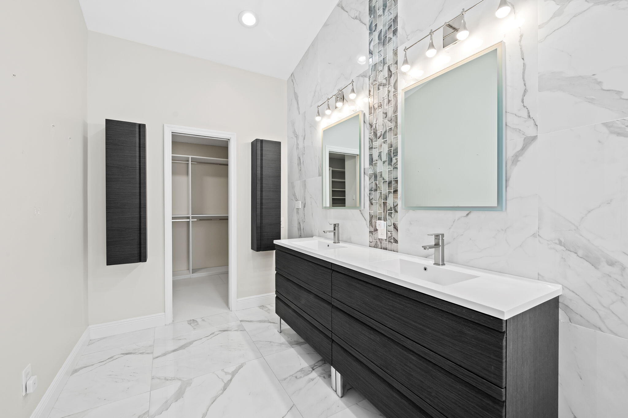 23162 L'Ermitage Circle Boca Raton, FL 33433 - Photo 32 of 48 a bathroom with a double vanity sink mirror and shower