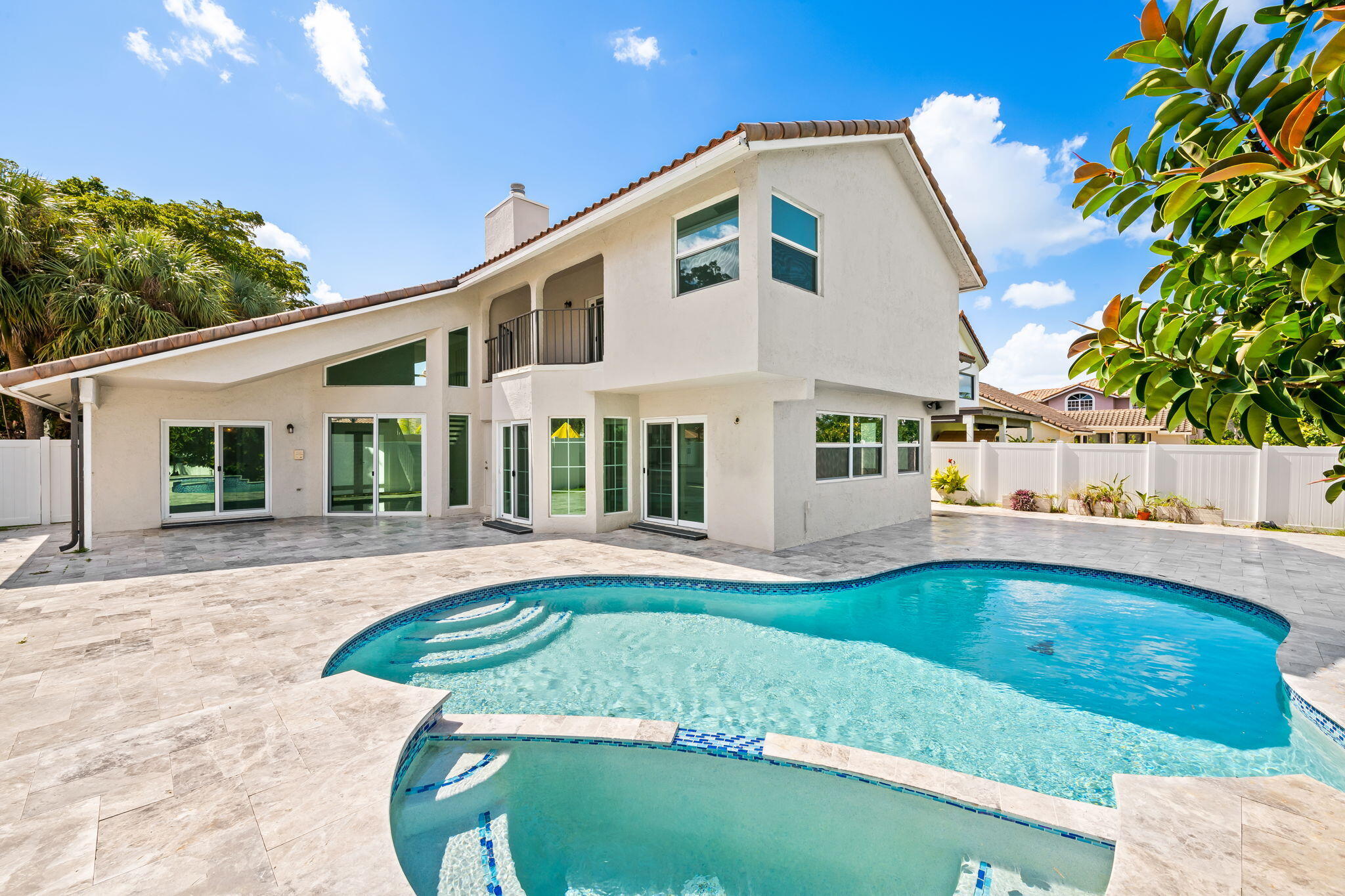 23162 L'Ermitage Circle Boca Raton, FL 33433 - Photo 37 of 48 a view of a house with a swimming pool