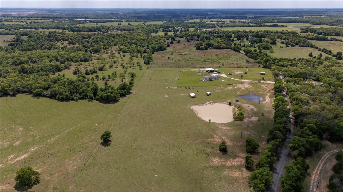 10976 Whiterock Road Bremond, TX 76629 - Photo 32 of 42 an aerial view of a houses with a lake